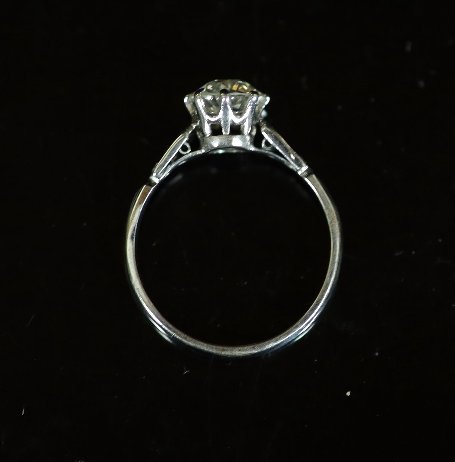 An 18ct white gold and single stone diamond ring